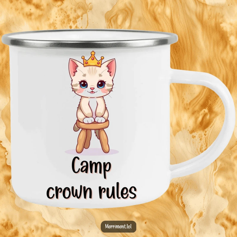 Funny camping mug illustration of a playful kitten wearing a tiny crown, balancing on a wobbly stool, perfect for outdoor sipping.
