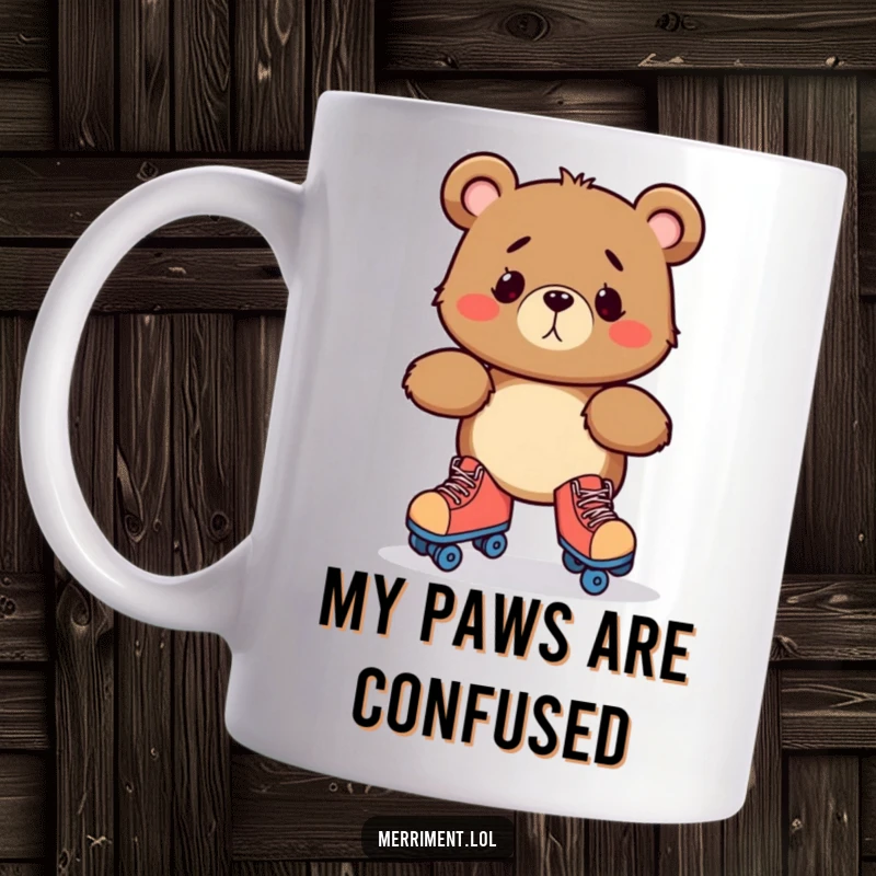 Funny mug featuring a bewildered bear character hilariously attempting to wear roller skates, wobbling precariously on its paws.