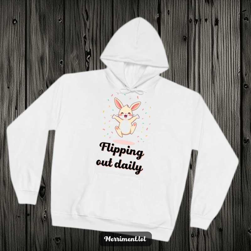 Funny hoodie with a happy bunny doing a cartwheel surrounded by confetti, offering warmth and a dose of playful celebration.