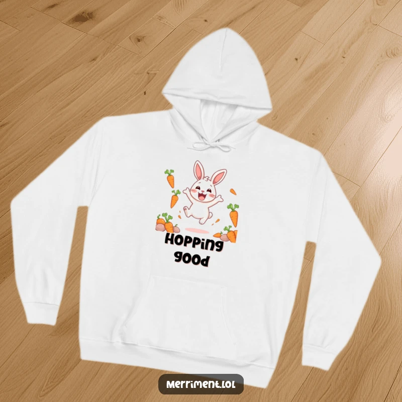 Funny hoodie showcasing a delighted rabbit character bouncing with immense excitement, with carrots floating playfully all around it.