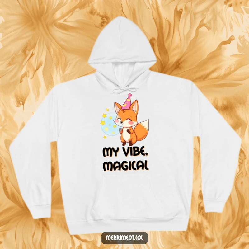 Funny hoodie depicting a delighted fox wearing a party hat and blowing a large bubble that bursts into a sky of stars.