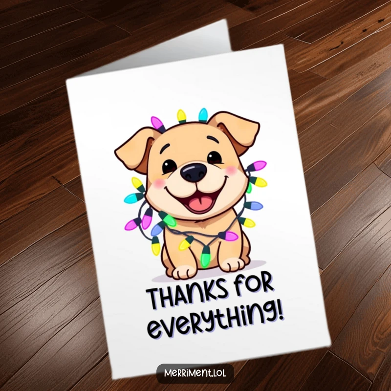 Funny free printable thank you card featuring a smiling dog wearing colorful, oversized fairy lights, expressing thanks.