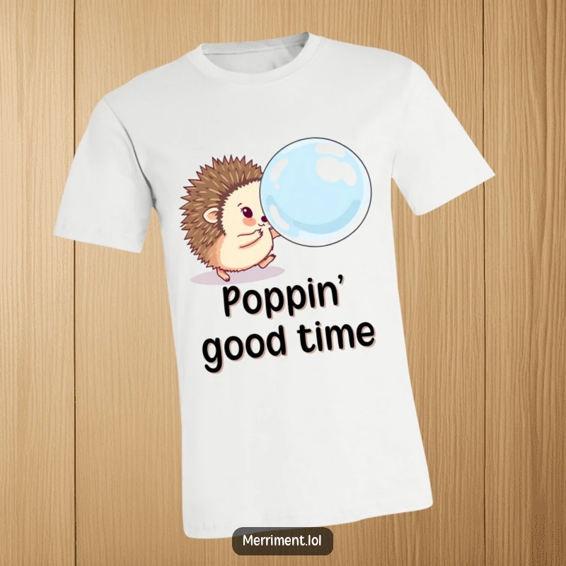 Funny hedgehog t-shirt depicting a fluffy animal eagerly chasing a comically large, bouncing soap bubble, showcasing playful determination and excitement.